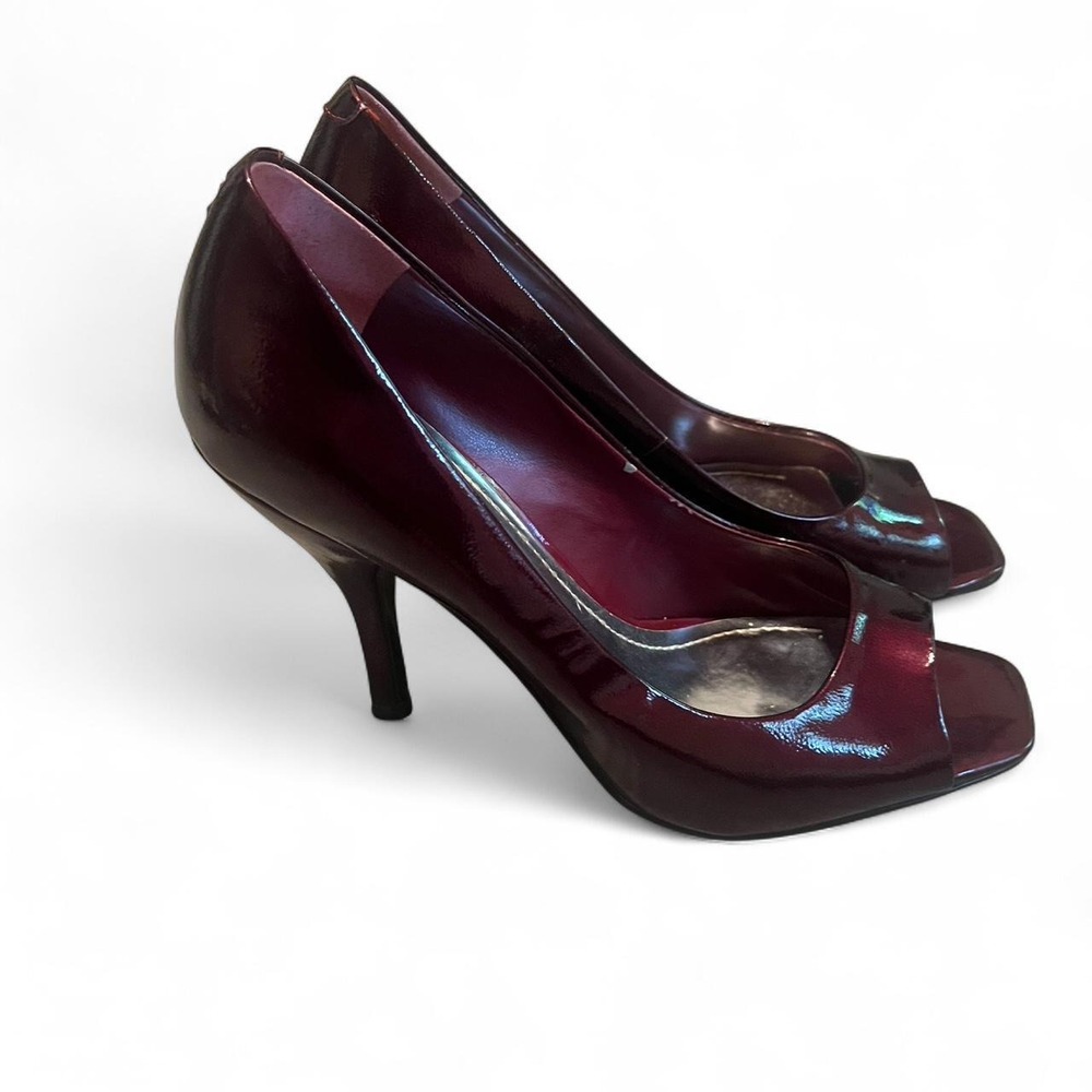 Candy red patent leather BCBG peep toe high heels with a 4.5" heel